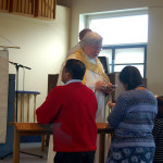 Communion in All Saints Episcopal Church in Waterloo